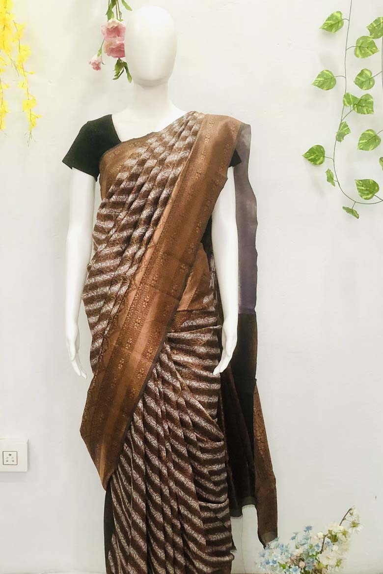 Brown color Kanjeevaram Art Silk Saree with leheriya print. Including Unstiched Blouse piece